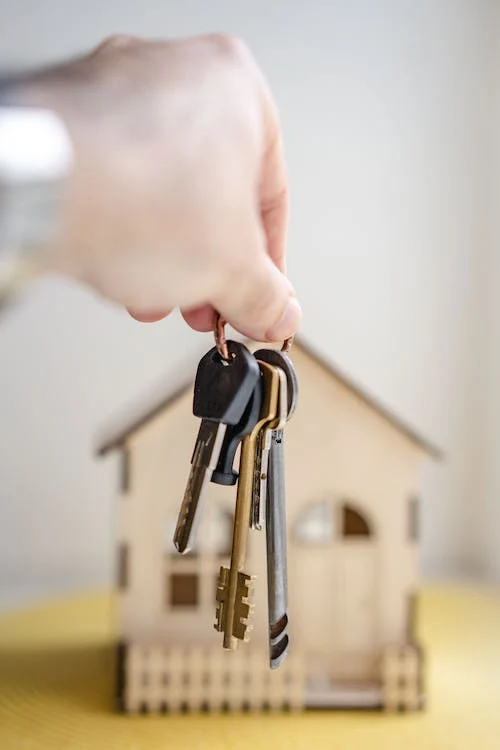 Keys in front of home